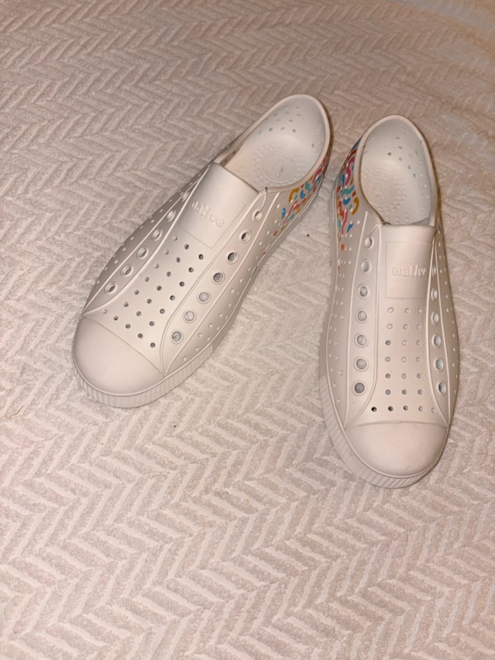 Native Shoes White Slip-On Sneakers with Multicolor Heel Accent